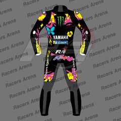 A full-body racing suit mockup on a gray background with repeated 'Racers Arena' watermarks. The suit is predominantly black with bright pink, yellow, and blue graphic accents and multiple sponsor logos including Monster Energy, Yamaha, and RR Racing.